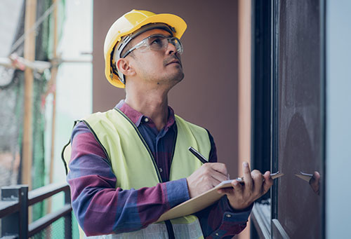 home inspector with clipboard